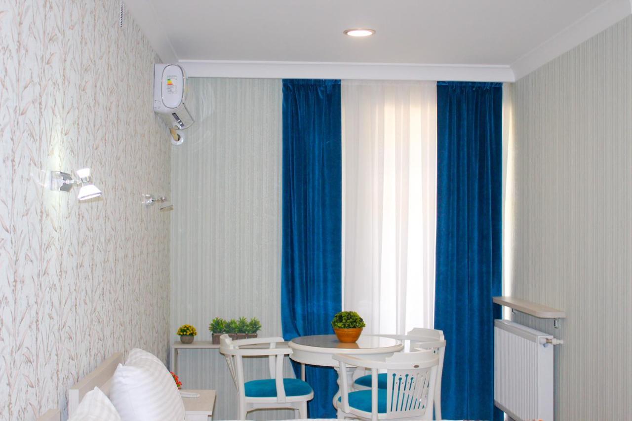 Hotel Taht Taskent Habitación foto